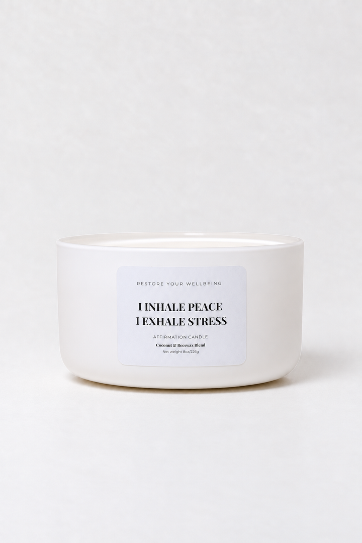White Calista glass affirmation candle labeled Inhale Peace, Exhale Stress